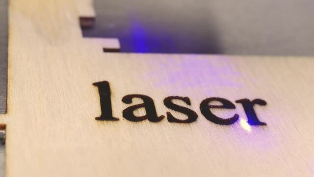 Laser engraving a word on plywood
