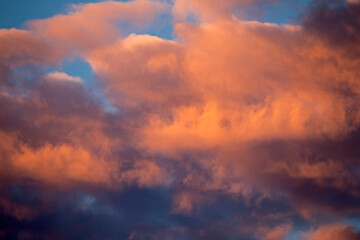 Naklejka na ściany i meble Colorful clouds in the sky at sunset time. Abstract color composition.