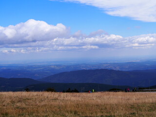 mountain view with meadow in the foreground and blue sky on a sunny day, Jesen&iacute;ky Mountains, Czech Republic, green-blue