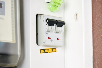 energy meter and electricity switch box indoors. repair and adjust domestic power wires and...