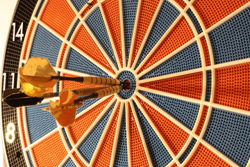 dart board with darts