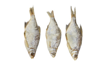 Three dry fish isolated on white background.