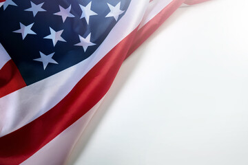 Close up of American flag on white blank space for text.