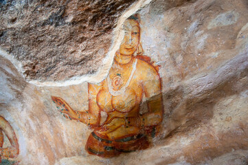 Sigiriya frescoes mural paintings sheltered gallery on Sigiriya rock fortress, Sri Lanka.