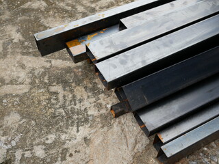 Obraz premium pile of metal rods at construction site,metal construction.