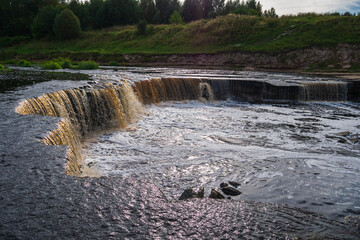 A stormy river with a brown hue.