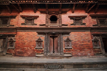 Fototapeta na wymiar Sundari Chowk: The south wing of Sundari Chowk, one of the courtyard in Patan Durbar Square, Kathmandu Nepal displays a beautiful example of woodwork date back to 17 century. 