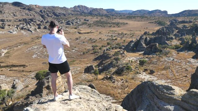 Tourist Takes a Photo of Landscape Isalo National Park, Madagascar