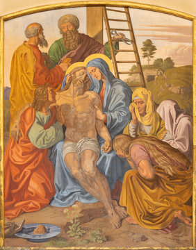 VIENNA, AUSTIRA - OCTOBER 22, 2020: The fresco of Deposition of the Cross (Pieta) as part of Cross way station in the church of St. John the Nepomuk by Josef Furlich (1844 - 1846).