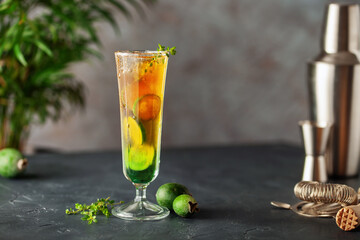 Cooling drink or tea with ice, feijoa and apple juice