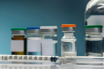 covid-19, coronavirus vaccine ampoule, bottle for injection.