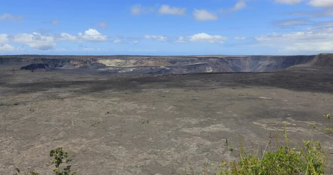 4k stationary locked off wide angle shot of Kīlauea, active shield volcano in the Hawaiian Islands that last erupted between 1983 and 2018, Kīlauea is the most active, Big Island,Hawaii,Usa 