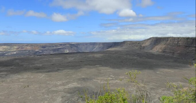Right to left panning motion of Kīlauea crater which last erupted in 2018, Kīlauea is the most active volcano, Volcano National Park,Big island,Hawaii,USA