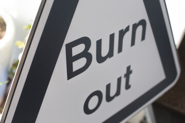 a sign with text BURN OUT, concept.