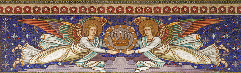 VIENNA, AUSTIRA - OCTOBER 22, 2020: The mosaic of angels withe the crown in church Pfarrkirche...