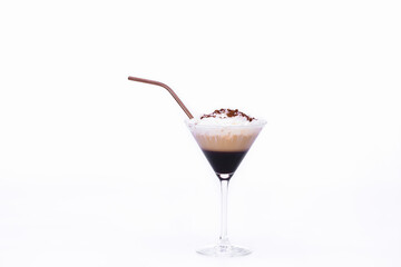 cocktail glass with a delicious capuccino with straw