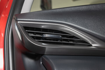 Obraz na płótnie Canvas Front Modern Car Air Vent in Car Interior on Zoom View
