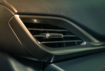 Air Vent in Car Interior on Zoom View in Vintage Tone