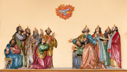 VIENNA, AUSTIRA - OCTOBER 22, 2020: The calved polychrome sculptural group of Pentecost in church...