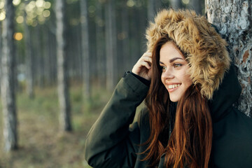 Woman outdoors in the forest trees fresh air freedom