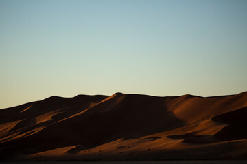 Fototapeta na wymiar Sand dune abstracts at first light, Sossusvlei, Namibia.