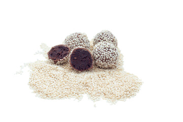Healthy raw energy balls with cocoa, chocolate, flaxseed, on a white background. Vegan Chocolate Truffles.