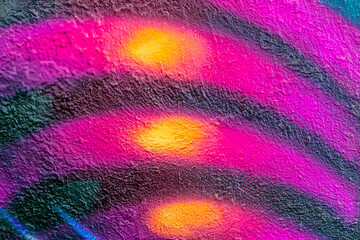 Art under ground. Beautiful street art graffiti background. The wall is decorated with abstract drawings house paint. Modern style urban culture of street youth. Abstract picture on wall