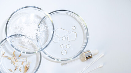 Serum for skin care, eco-friendly cosmetics. Bottles and ingredients