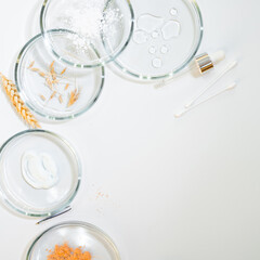 Development Of eco-friendly and modern cosmetics for skin care, a set of bottles and ingredients,