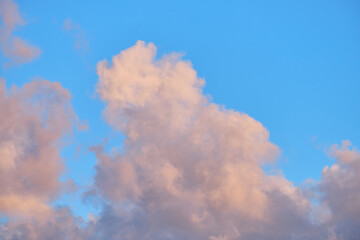 Large air clouds in summer in the evening sky