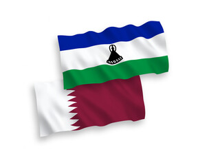 Naklejka premium Flags of Lesotho and Qatar on a white background