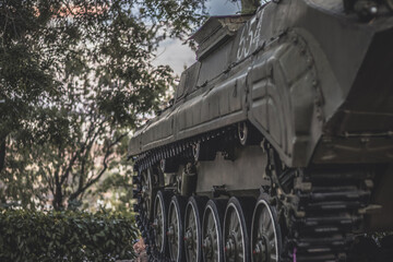 Track huge black tank close-up with copy space, army military forces vehicle