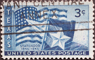 USA - Circa 1945: a postage stamp printed in the US showing the U.S. flag with a ray shining from...