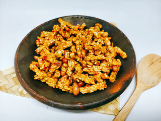 kering tempe is a traditional infonesian food that is consist of tempeh and cooked with garlic, onion, chili, and palm sugar