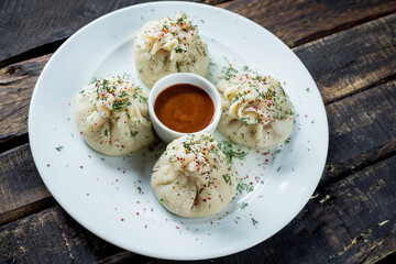 hinkali Georgian dish on white plate.