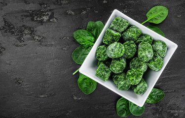 Portion of frozen spinach (close up; selective focus)