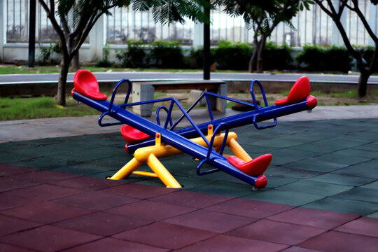 View playground in garden park colorful playground for children	