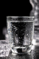 Portion of sparkling water (detailed close up shot; selective focus)