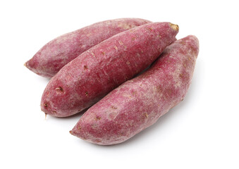 Purple Colored Sweet Potatoes on White background