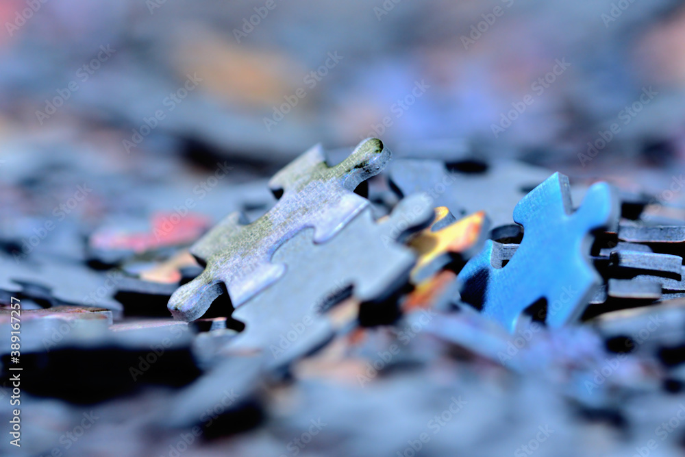 Aufkleber stack of puzzle pieces. close-up detail macro.
