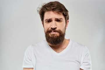 Obraz premium emotional bearded man close-up facial expression studio lifestyle