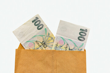 100 Czech crowns banknote closeup in paper envelop isolated
