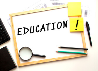 The text is written on a white office board. Business concept.