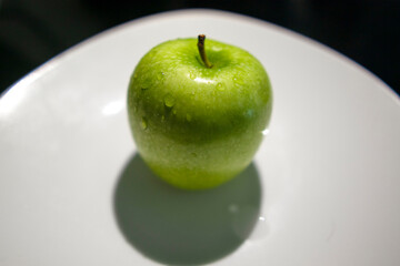 green apple one the plate