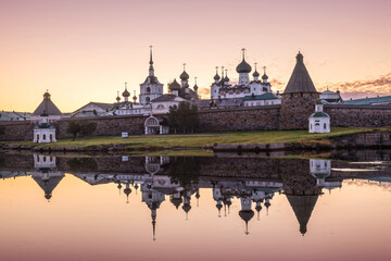 Obraz premium Mirror reflections of the Solovetsky Monastery in the calm water