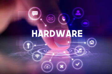 Finger touching tablet with web technology icons and HARDWARE inscription, web technology concept