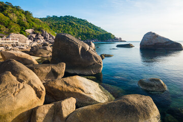 Rocky sea beach morning sunrise turquoise water