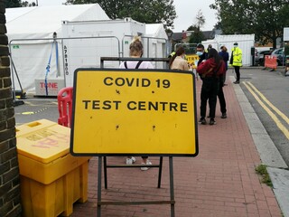 Covid-19 coronavirus test centre road sign  in North London UK, covid-19 test testing center s set...