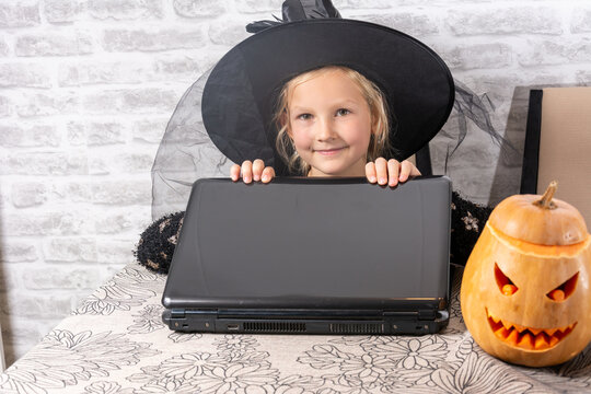 Kid Say Cheers. Dressed In Spooky Halloween Costumes Girl Headwear Having Video Chat On Laptop