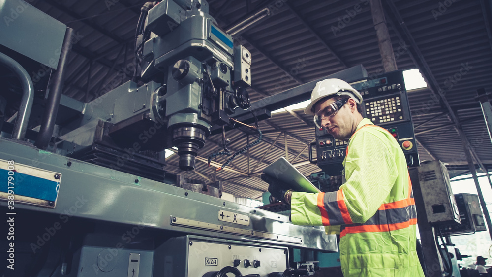 Poster smart factory worker using machine in factory workshop . industry and engineering concept.